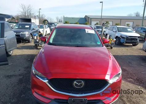 2021 Mazda Cx-5 Grand Touring Reserve z USA, uszkodzony, nr VIN JM3KFBAY5M0306115